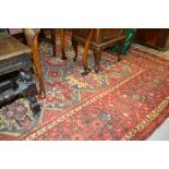 Mid 20th Century Afghan Beshir style carpet with multiple geometric medallions on a fawn ground