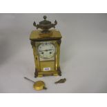 Late 19th or early 20th Century French gilt brass four glass library clock,