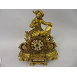 19th Century gilded spelter and porcelain mounted two train mantel clock with figural surmount