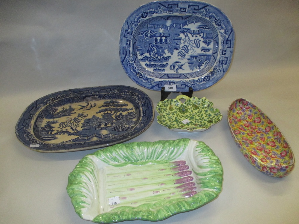 Two blue and white transfer printed meat dishes, an asparagus dish,
