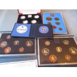 Presentation box containing four silver proof one pound coins,