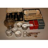 Cased set of six silver coffee spoons with shell pattern bowls and bean handles,