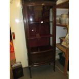 Edwardian mahogany semi bow fronted single door display cabinet on square tapering and spade