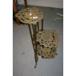 Brass three tier cake stand on shaped supports