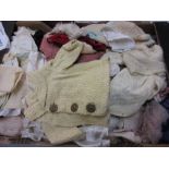 Box containing a quantity of various babies and dolls clothes