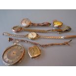 Four various ladies gold cased wristwatches, one with a 9ct gold expanding bracelet strap,