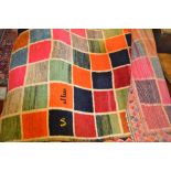 Modern Gabbeh rug with multiple square tile pattern design and border,