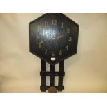 Art Deco ebonised wooden wall clock with hexagonal dial,