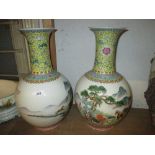 Pair of large reproduction Chinese baluster form vases decorated with landscapes