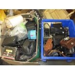 Two boxes containing a large quantity of various SLR cameras including Yashica and many others,