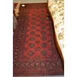 Afghan style rug having red ground, 1.92m x 1.