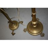 Edwardian brass lamp standard with paw feet and opaque glass shade adapted for use with electricity