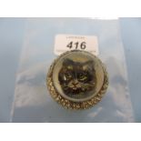 White metal cane handle inset with a glass intaglio depicting a cat
