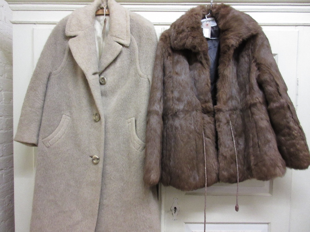 Llama fur coat together with another fur coat