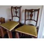 Pair of Edwardian mahogany and marquetry inlaid side chairs with yellow upholstered overstuffed