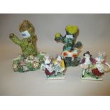 Pair of small Naples porcelain figures,