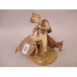 Royal Worcester blush ivory and gilt decorated figure of a goatherd playing a pipe (slight damage