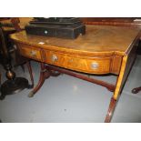 Mahogany drop-leaf bow front sofa table having crossbanded and line inlaid top above two short