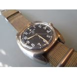 British military issue Hamilton stainless steel wristwatch, the black dial with Arabic numerals,