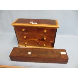 Miniature table top chest of drawers and an antique cribbage board (a/f)