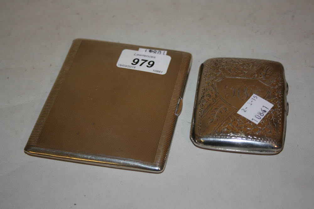 Birmingham silver engraved cigarette case and another engine turned silver double cigarette case