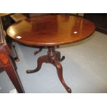 19th Century circular mahogany tripod table,