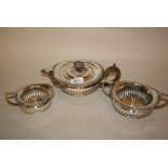 Late 19th Century silver tea service of circular half fluted design, London,