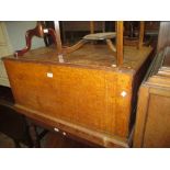 19th Century oak trunk with hinged cover and plinth base