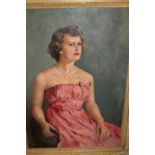 20th Century oil on canvas, half length portrait of a seated lady, signed T.M.
