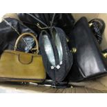 Box containing a quantity of various vintage unnamed leather handbags including: vinyl handbags and