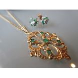 9ct Gold green stone set pendant on chain,