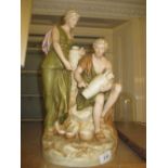 Large Royal Dux figural group of a classical maiden and a seated man decorating a vase,