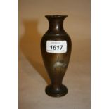 Small late 19th or early 20th Century Japanese bronze baluster form vase inlaid with precious