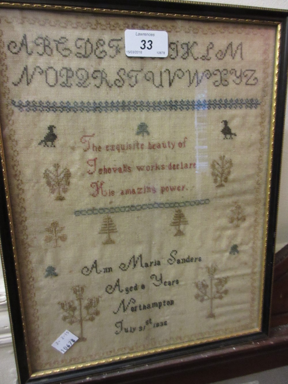 William IV needlepoint sampler of alphabet motto and pictorial design, signed Ann Maria Sanders,