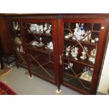 Edwardian mahogany low breakfront display cabinet having three astragal glazed doors enclosing