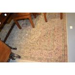 Turkish Persian pattern medallion and floral design carpet (faded),