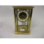 Late 19th or early 20th Century gilt brass cased four glass library clock,