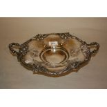 19th Century circular silver two handled dish relief moulded with flowers, Birmingham,