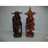 Chinese carved hardwood figure of a sage and another similar