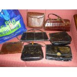 Group of six various black and brown vintage simulated crocodile skin leather handbags
