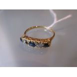 18ct Gold sapphire and diamond dress ring