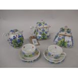Rosenthal miniature floral encrusted eight piece teaset comprising: teapot, cream jug with lid,