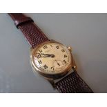 Gentlemans 9ct gold Benson wristwatch with Arabic numerals and subsidiary seconds