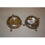 Pair of good quality Victorian silver table salts with chased decoration on hoof and shell supports