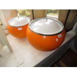 Two 20th Century orange opaque and chrome mounted globe shaped hanging light shades