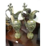 Pair of large 19th Century bronze pedestal jug vases having all-over cast cherub and floral