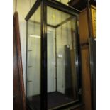Ebonised and four glass table top shop display cabinet