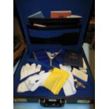 Two cases containing a quantity of Masonic regalia and books etc