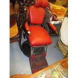 Early 20th Century black Japanned chrome and red leather upholstered barbers chair with fully