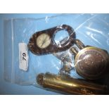 Small brass cased cigarette lighter incorporating a 1945 ha'penny,